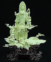 KWANYIN W/FLOWER CHILD #(9627) Carving Handmade in China Click on the dragon to see a larger picture.
