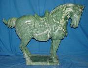 REAL JADE  LG.  30 in.  SADDLED TANG Dynesty Chinese War HORSE, ITEM # (LH3) This horse is made from one piece solid jade. It appears light green with some area dark green. It comes with a wooden base. $760.00. Size: L:30 in. X D:9 in. X H:24 in.
Click Here To See Big Picture.