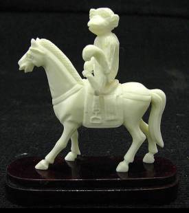 BONE SADDLED HORSE W/MONKEY (2106B)