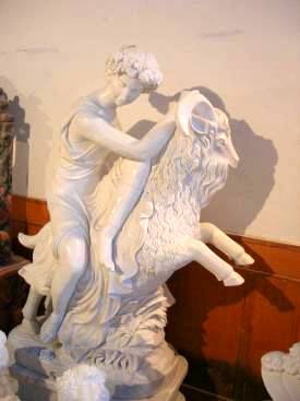 marble carving, Marble Garden Carving boy riding ram  photo