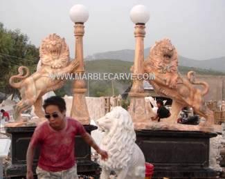 marble lion carving sculpture pair of hand sculpted Lions holding light photo image